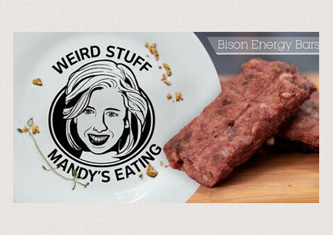 cartoon image of Mandy Oaklander featuring a picture of two EPIC bison bars